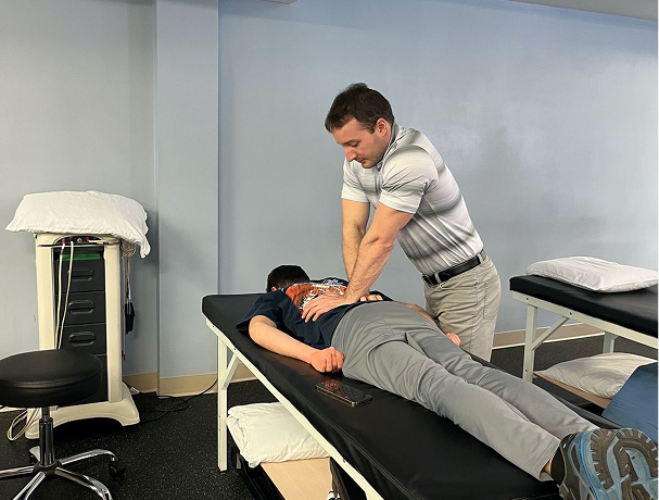 Hands-on manual spinal therapy at Global Spine Clinic